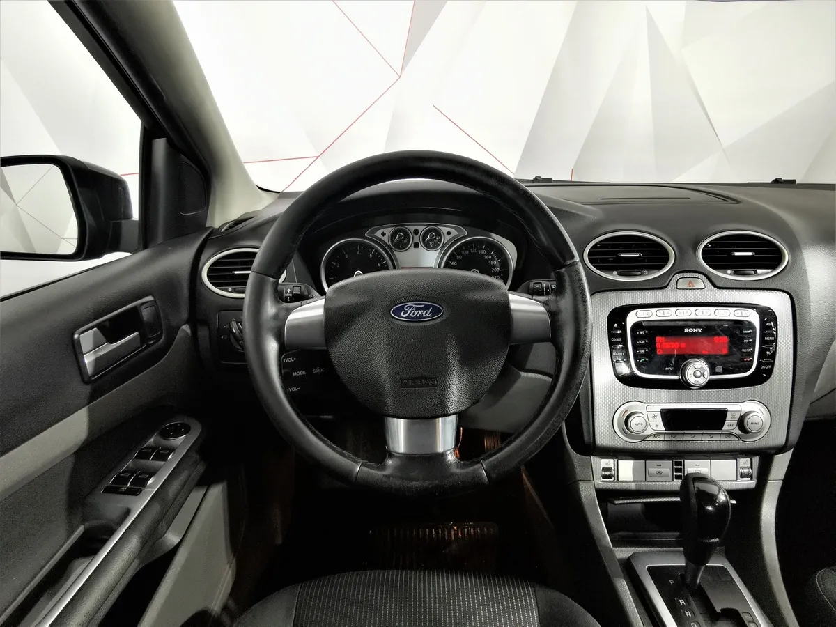 Ford Focus 1.6 AT (101 л.с.) Titanium Фиолетовый в АВИЛОН. Слайд №17