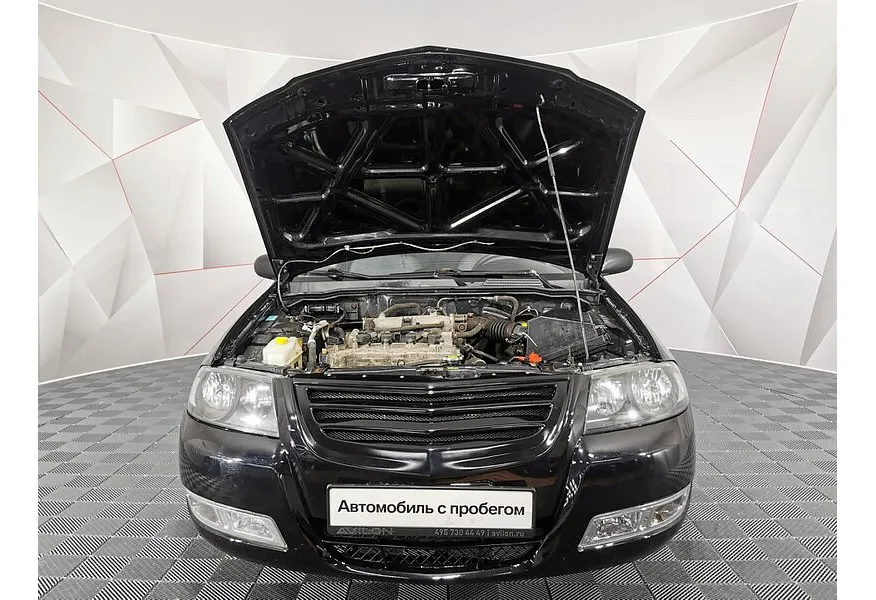 Nissan Almera Classic 1.6 MT (107 л.с.) Черный в АВИЛОН. Слайд №11