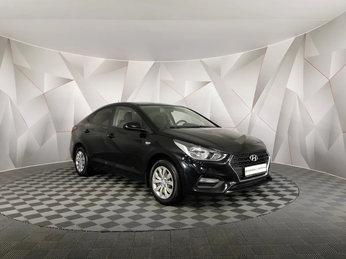 Hyundai Solaris 1.6 AT (123 л.с.) Comfort + Advanced + Winter Черный в АВИЛОН. Слайд №3