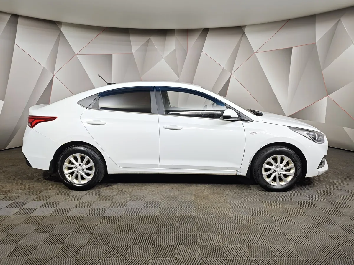 Hyundai Solaris 1.6 MT (123 л.с.) Elegance Белый в АВИЛОН. Слайд №6