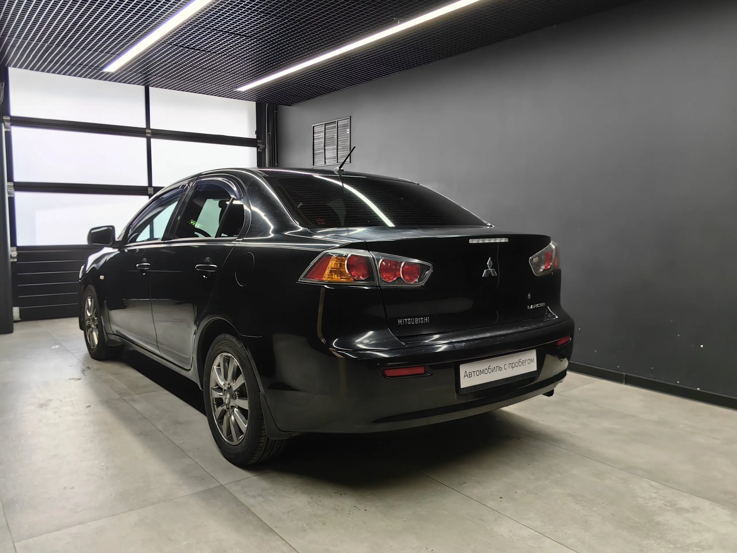 Mitsubishi Lancer 1.6 AT (117 л.с.) Черный в Москве № ТИ-UY41112. Купить  Mitsubishi Lancer X Рестайлинг Автомат Бензиновый с пробегом 138684 км.  Цена 859000