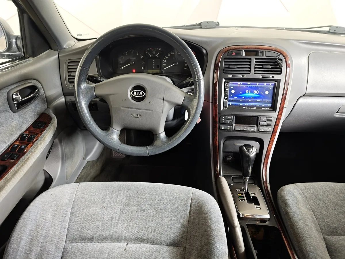 Kia Magentis 2.5 AT (166 л.с.) Черный в АВИЛОН. Слайд №18
