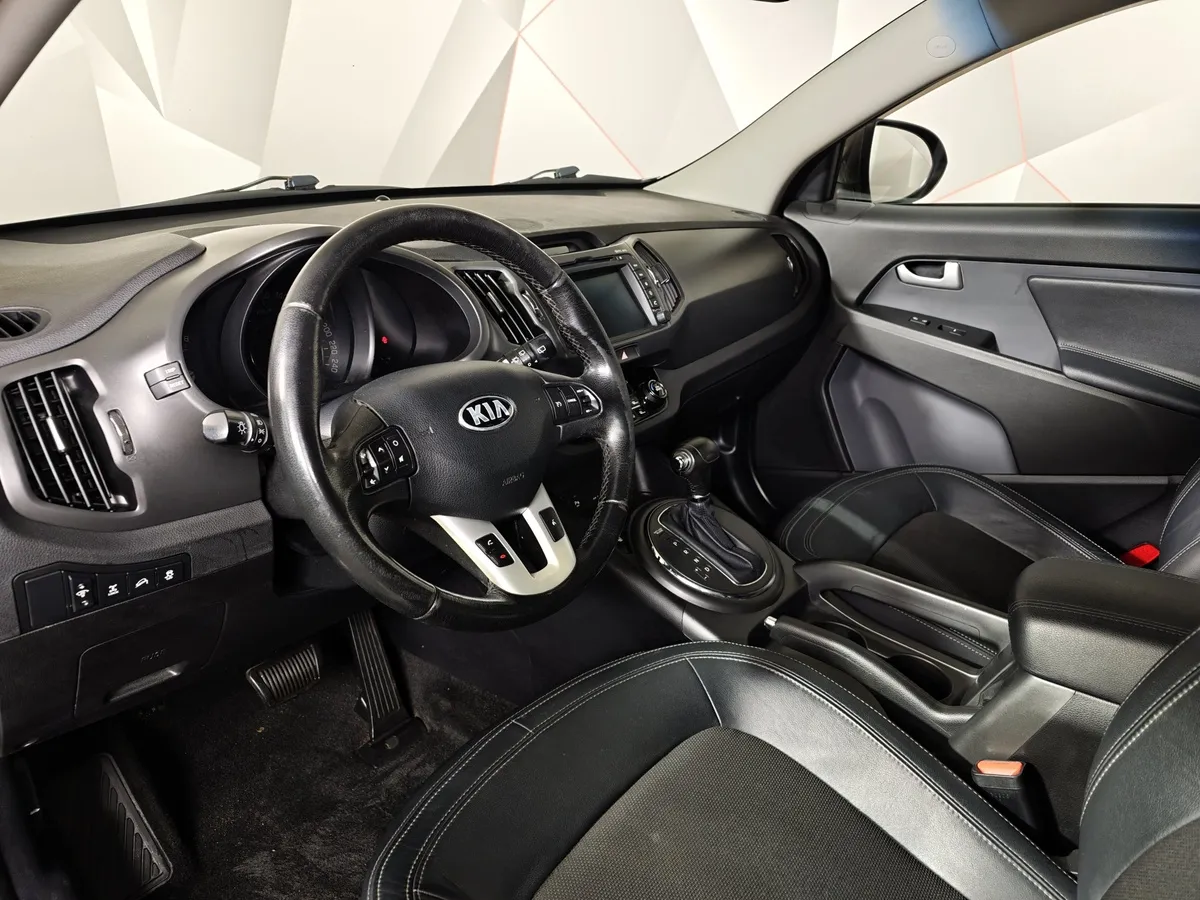 Kia Sportage 2.0 AT AWD (150 л.с.) Коричневый в АВИЛОН. Слайд №19