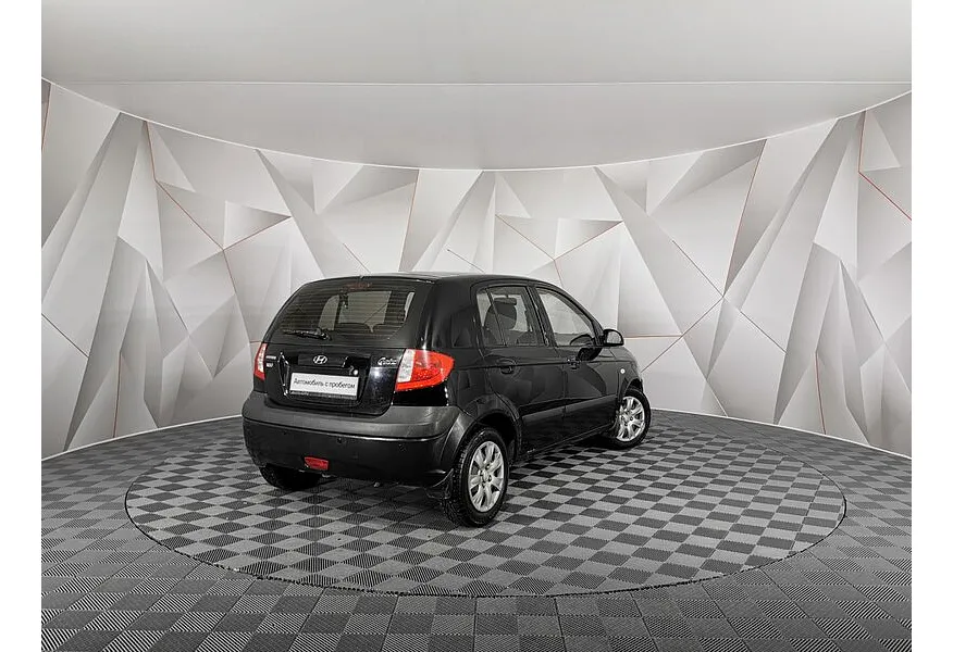 Hyundai Getz 1.4 AT (97 л.с.) Черный в АВИЛОН. Слайд №2