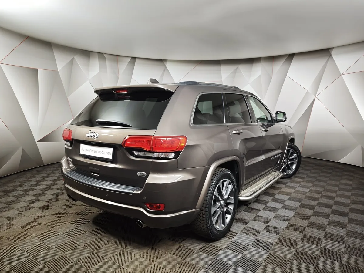 Jeep Grand Cherokee 3.6 AT AWD (286 л.с.) Overland Коричневый в АВИЛОН. Слайд №2