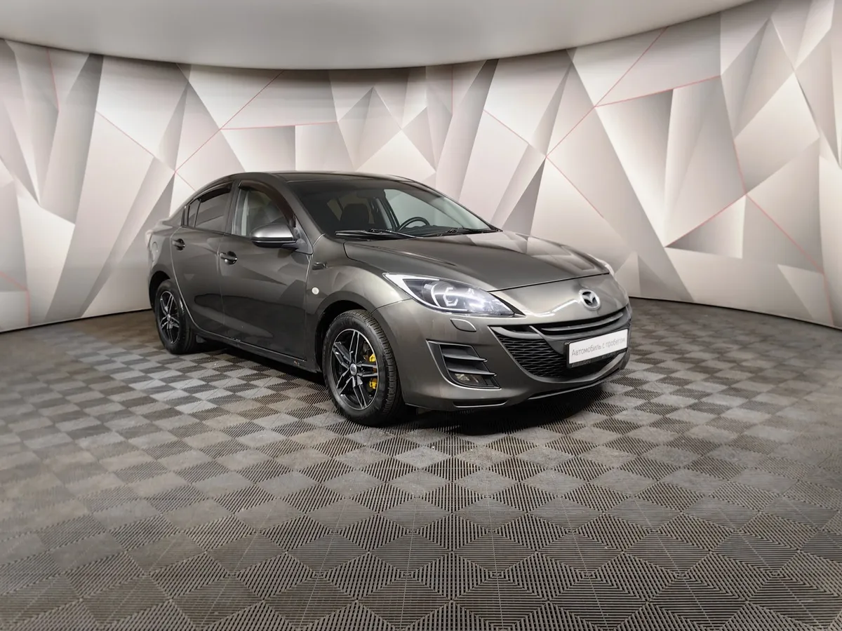Mazda 3 1.6 AT (105 л.с.) Серый в АВИЛОН. Слайд №3