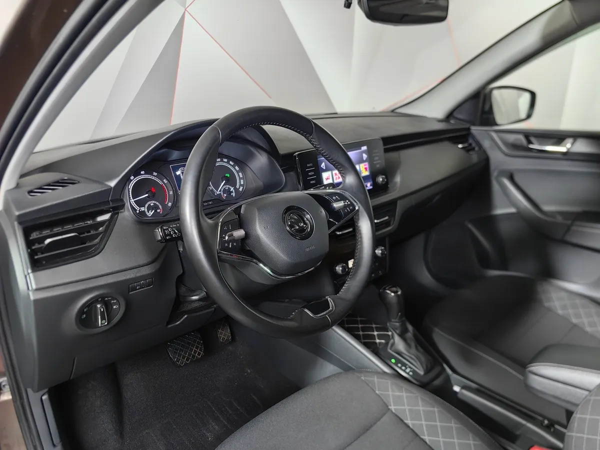Skoda Rapid 1.6 AT (110 л.с.) Белый в АВИЛОН. Слайд №19