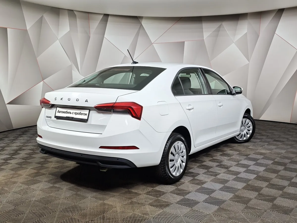 Skoda Rapid 1.6 AT (110 л.с.) Белый в АВИЛОН. Слайд №2
