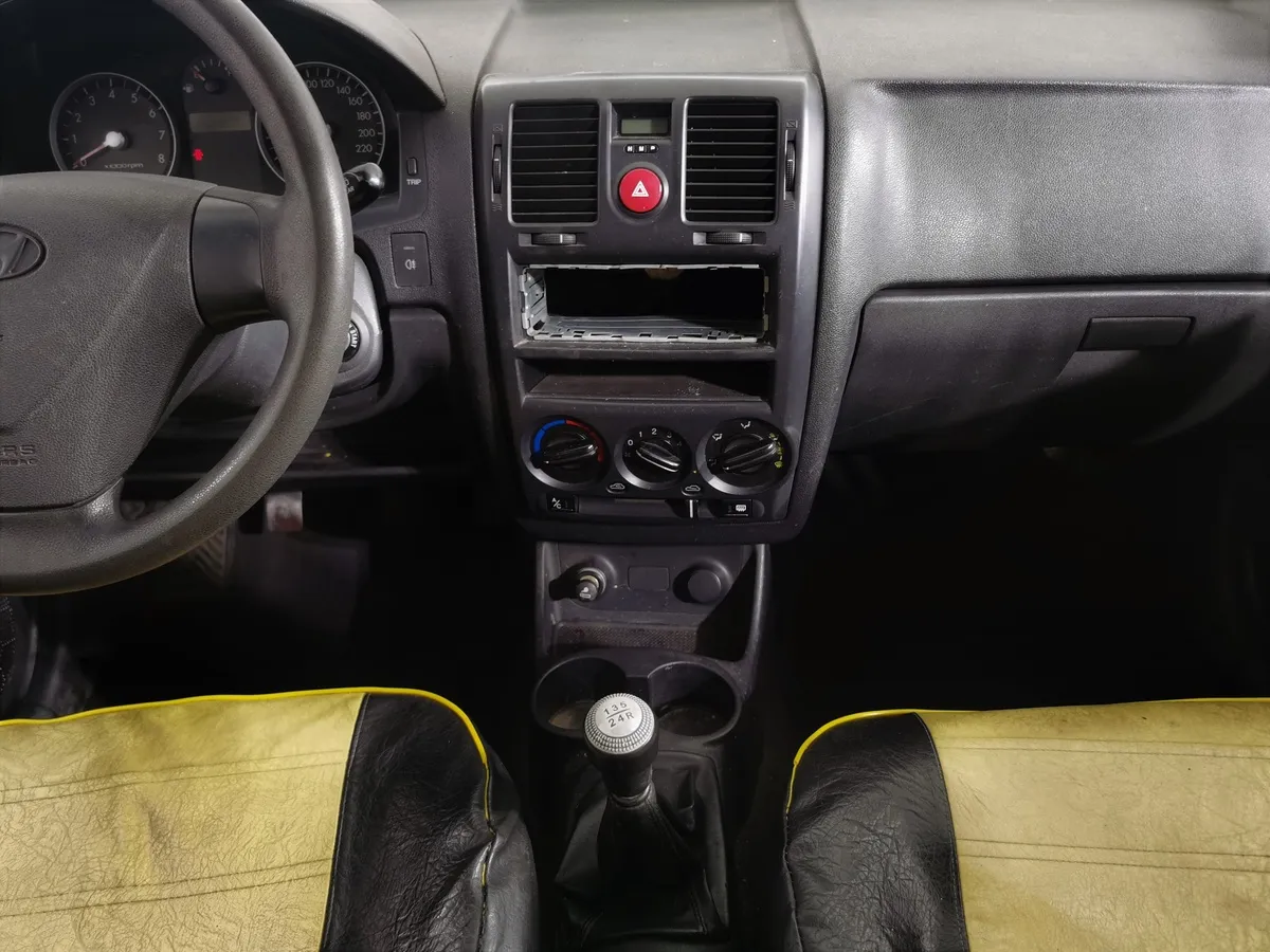 Hyundai Getz 1.4 MT (97 л.с.) Желтый в АВИЛОН. Слайд №12