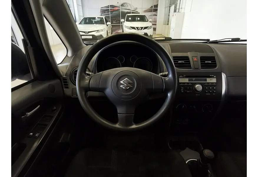 Suzuki SX4 1.6 MT (107 л.с.) Серебристый в АВИЛОН. Слайд №19