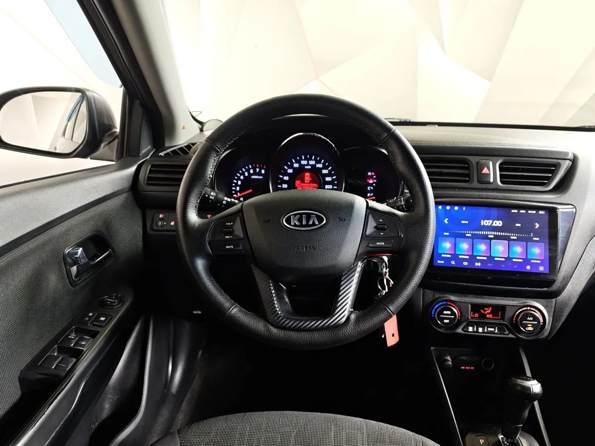 Kia Rio 1.6 AT (123 л.с.) Серый в АВИЛОН. Слайд №17