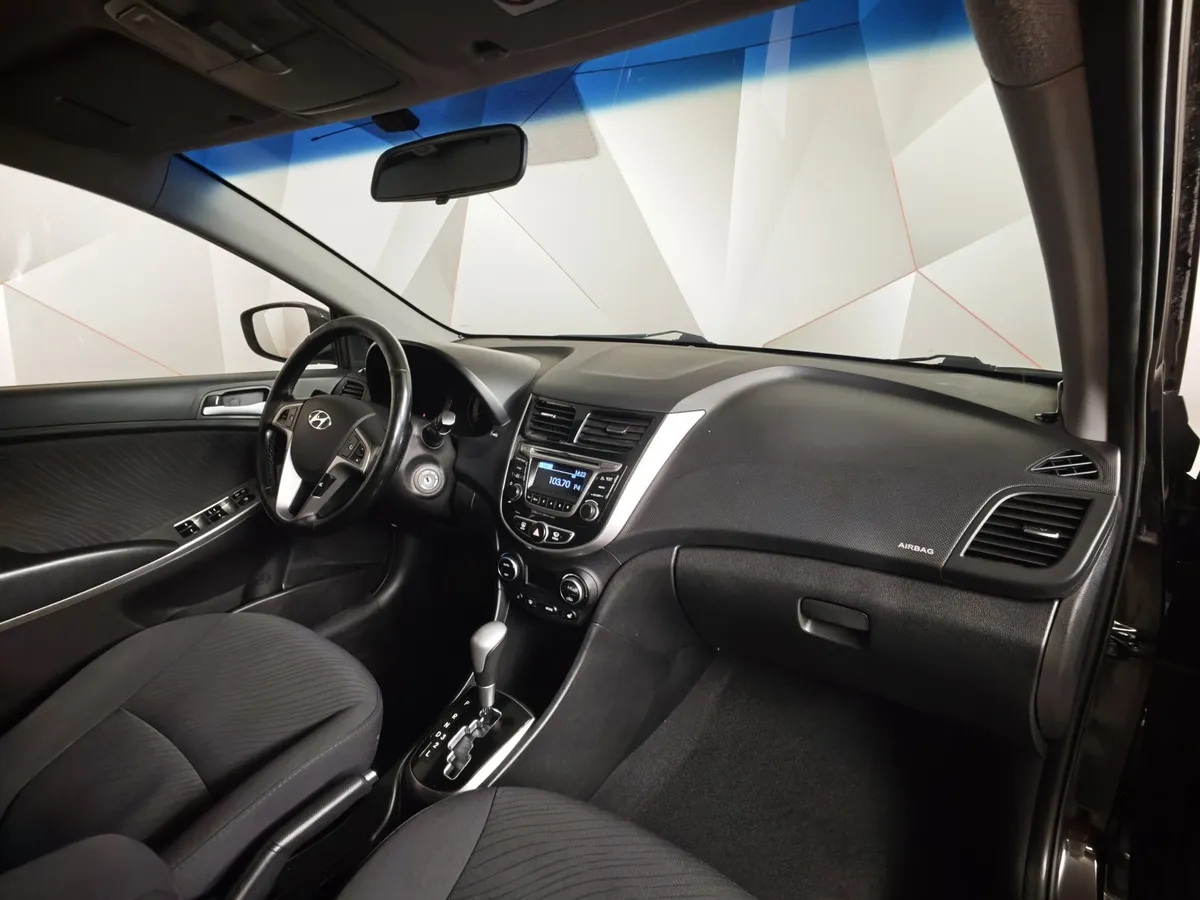 Hyundai Solaris 1.4 AT (107 л.с.) Style Черный в АВИЛОН. Слайд №12