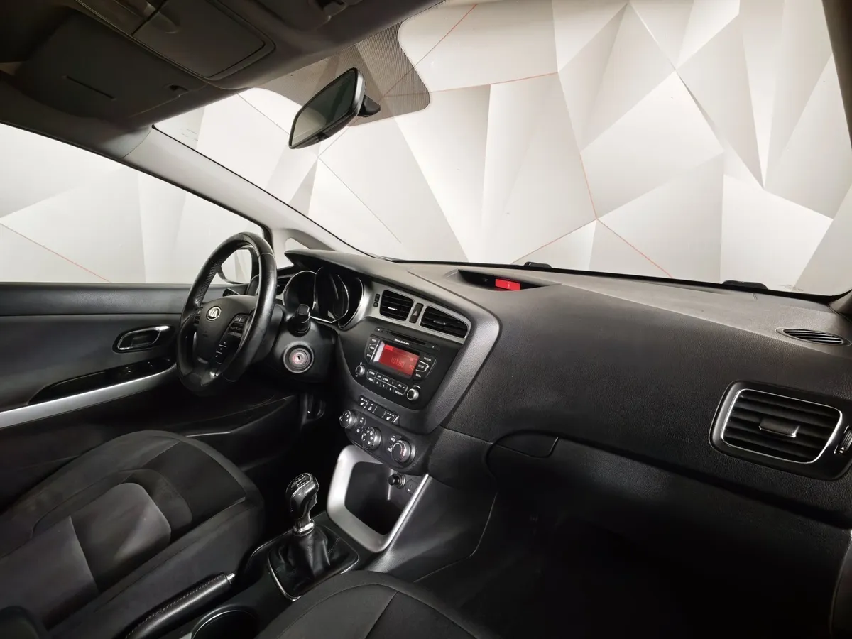 Kia Ceed 1.6 MT (122 л.с.) Коричневый в АВИЛОН. Слайд №13