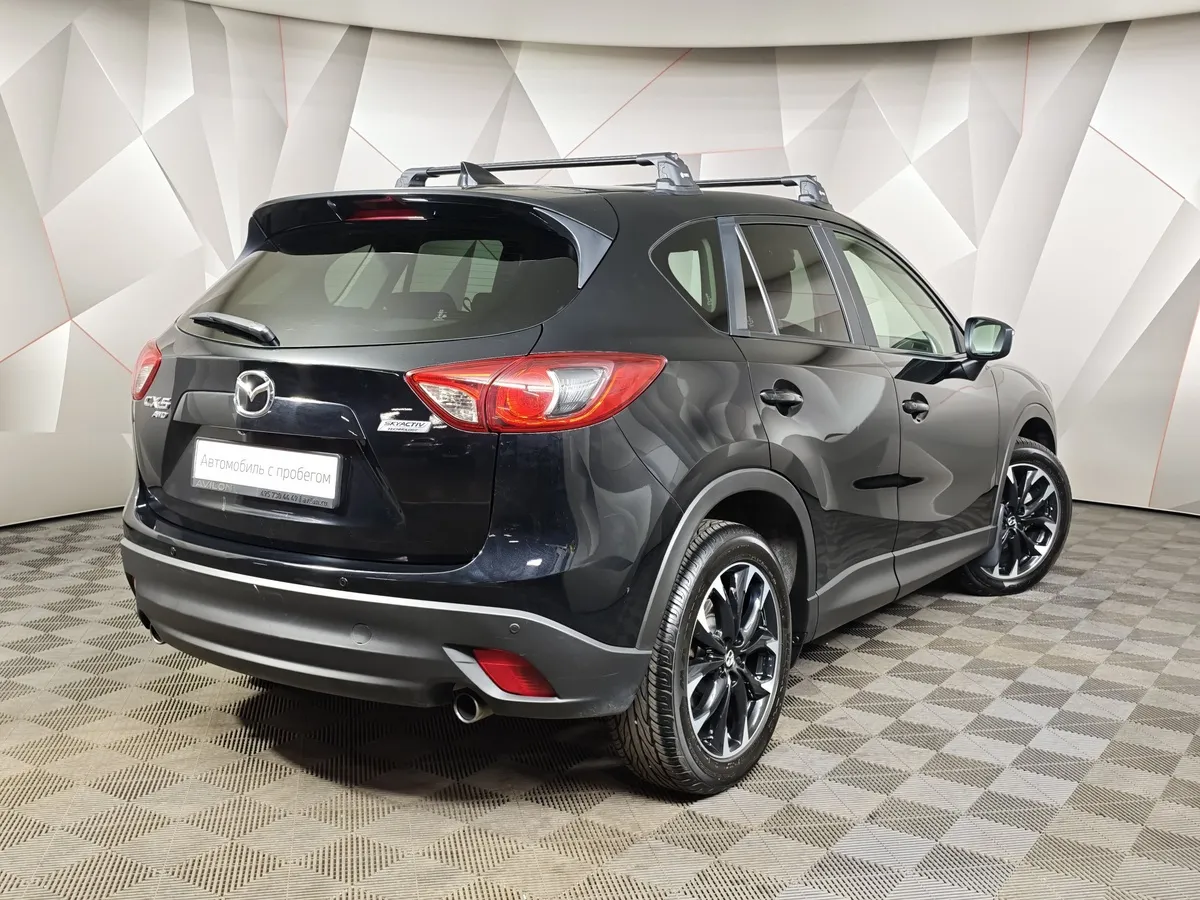 Mazda CX-5 2.0 AT 4WD (150 л.с.) Drive Черный в АВИЛОН. Слайд №2