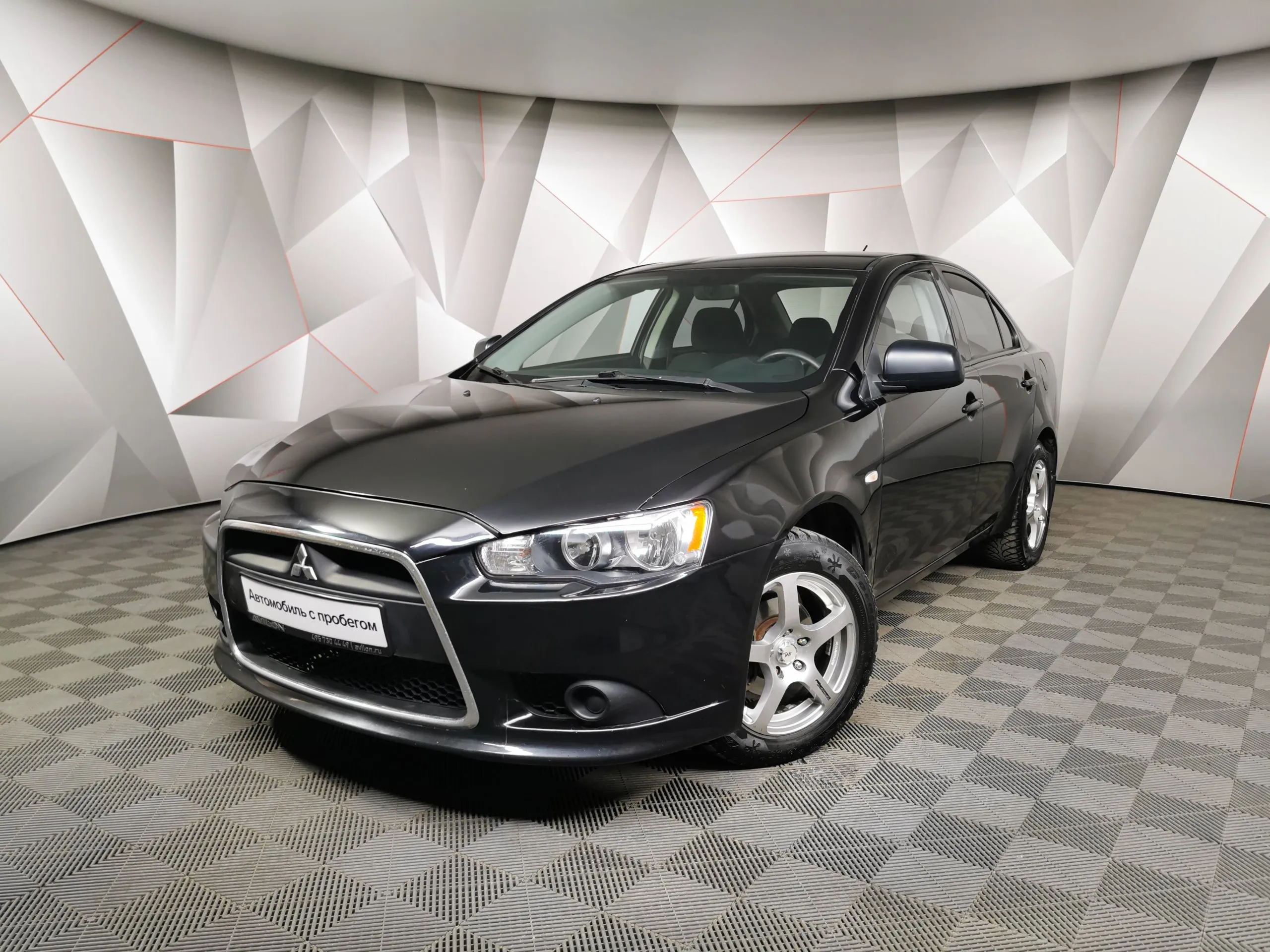 Mitsubishi Lancer 1.6 AT (117 л.с.) Черный в Москве № ТИ-UY40796. Купить Mitsubishi  Lancer X Рестайлинг Автомат Бензиновый с пробегом 137189 км. Цена 865650