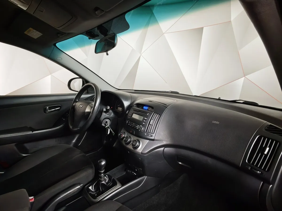 Hyundai Elantra 1.6 MT (105 л.с.) Черный в АВИЛОН. Слайд №11