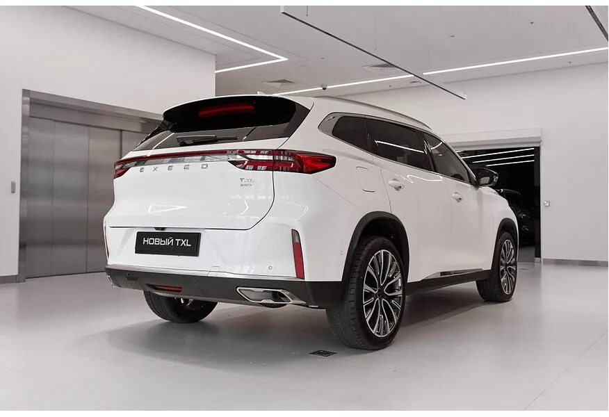 EXEED TXL 2.0 8AT AWD (197 л.с.) Flagship Белый в АВИЛОН. Слайд №3