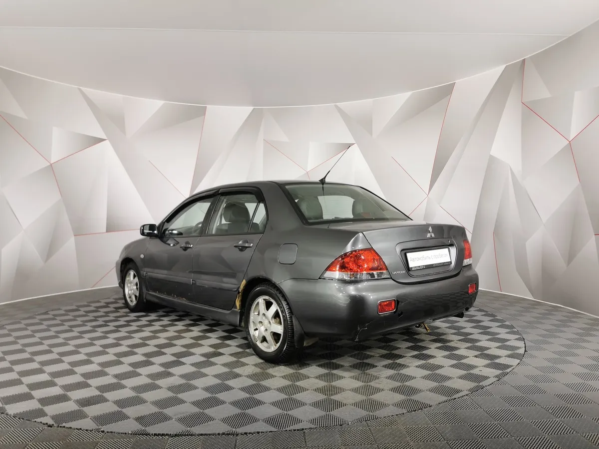 Mitsubishi Lancer 1.6 AT (98 л.с.) Серый в АВИЛОН. Слайд №4