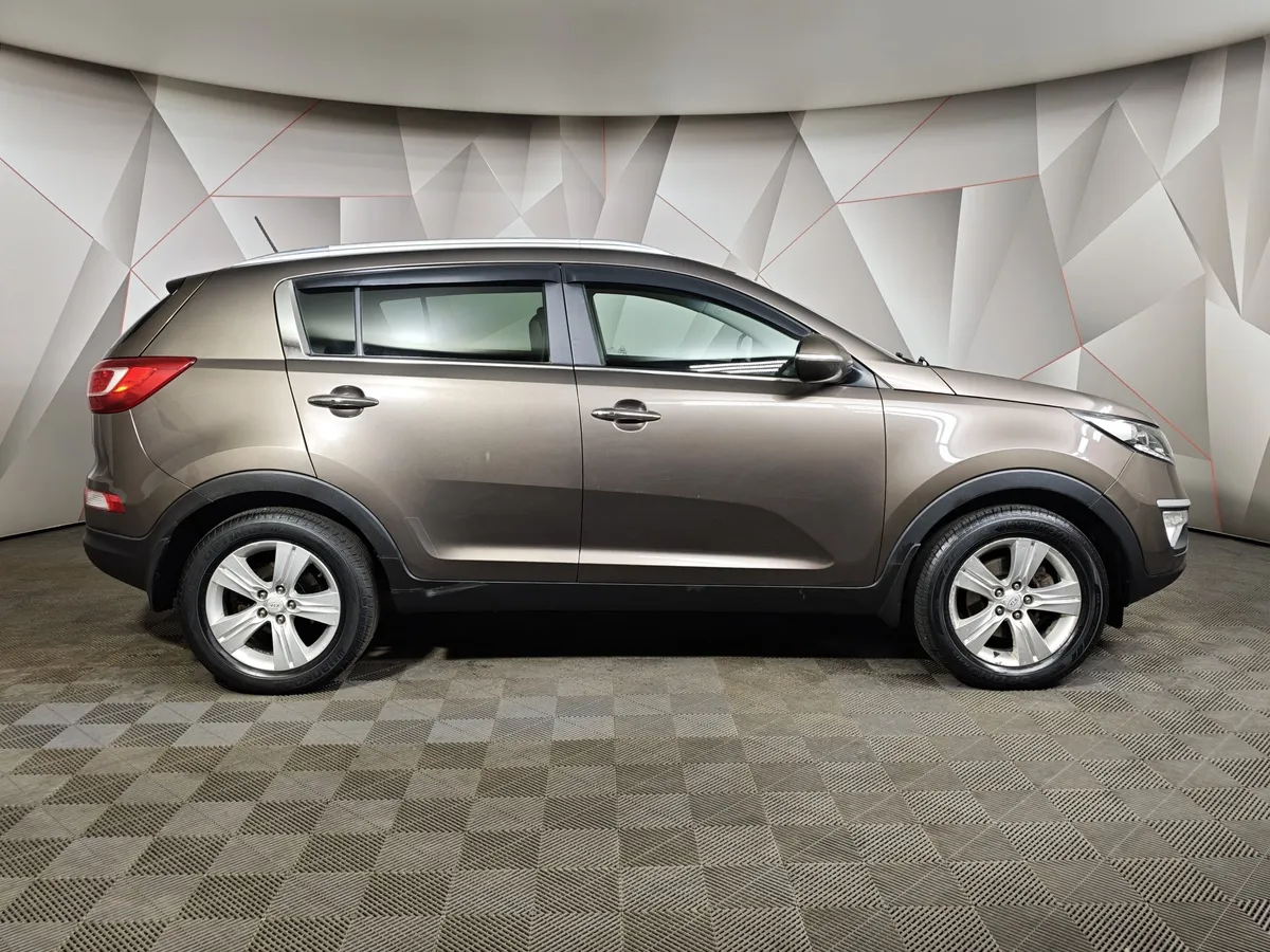 Kia Sportage 2.0 AT AWD (150 л.с.) Коричневый в АВИЛОН. Слайд №6