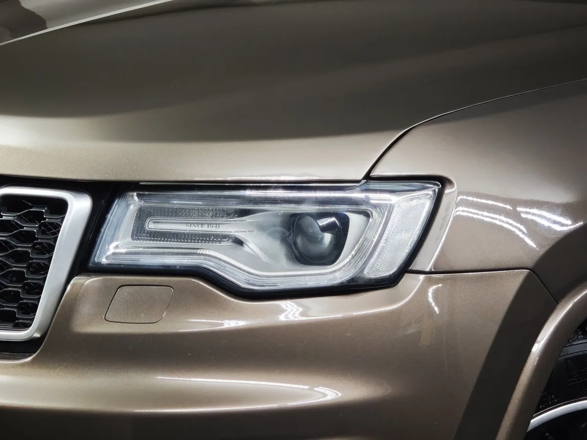 Jeep Grand Cherokee 3.6 AT AWD (286 л.с.) Overland Коричневый в АВИЛОН. Слайд №10