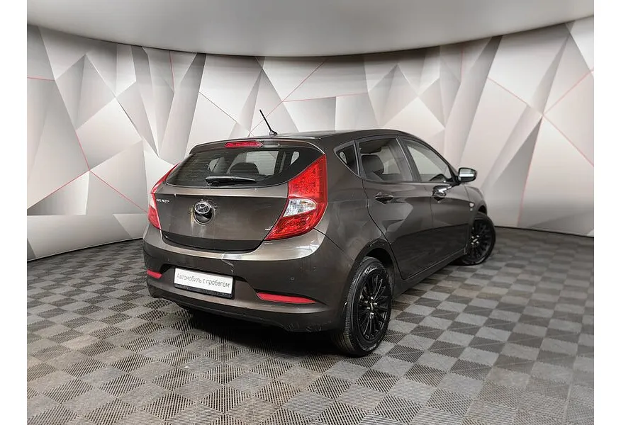 Hyundai Solaris 1.6 AT (123 л.с.) Comfort Коричневый в АВИЛОН. Слайд №2