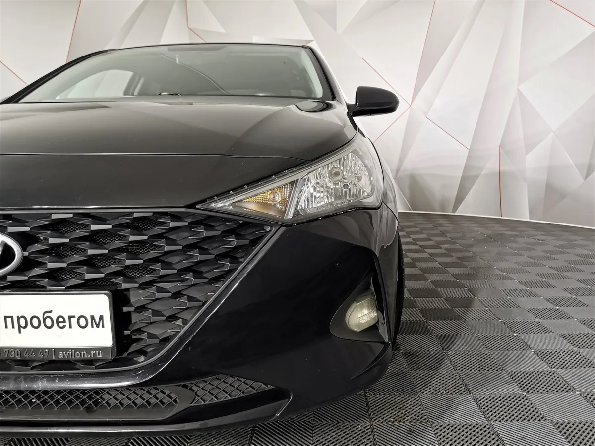 Hyundai Solaris 1.6 AT (123 л.с.) Comfort + Light Черный в АВИЛОН. Слайд №10
