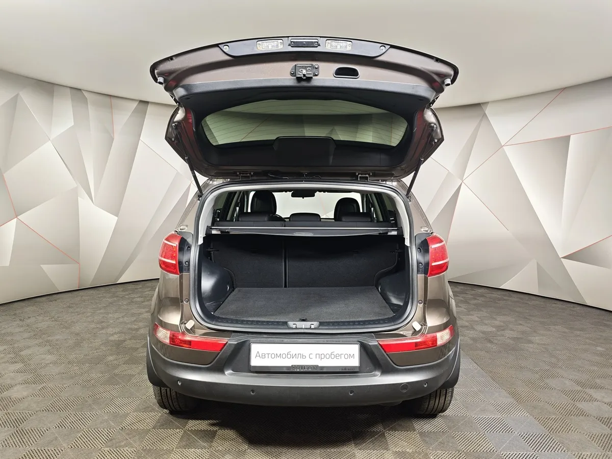 Kia Sportage 2.0 AT (150 л.с.) Коричневый в АВИЛОН. Слайд №12