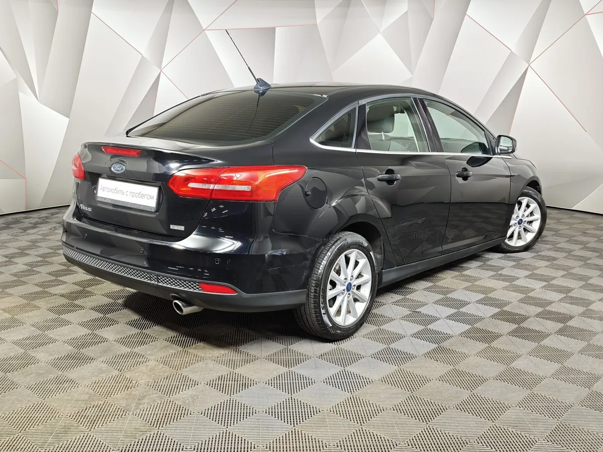Ford Focus 1.5 EcoBoost AT (150 л.с.) Titanium Черный в АВИЛОН. Слайд №2