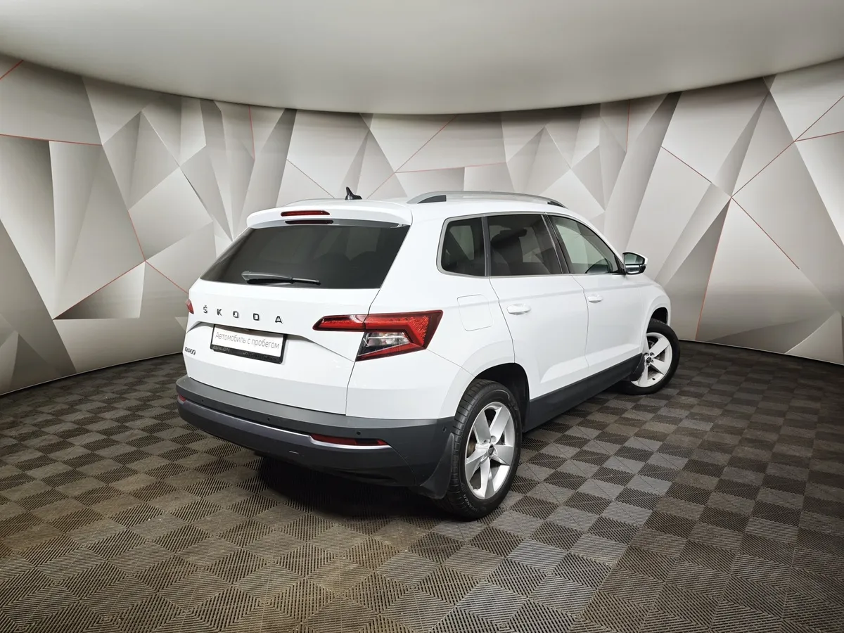 Skoda Karoq 1.4 AT FWD (150 л.с.) Ambition Белый в АВИЛОН. Слайд №2