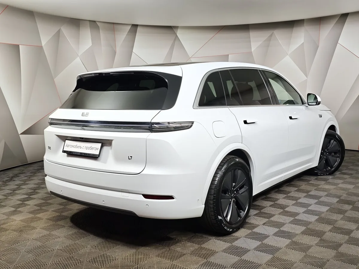 Li Auto L7 1.5 AT 4WD (449 л.с.) Pro Белый в АВИЛОН. Слайд №2