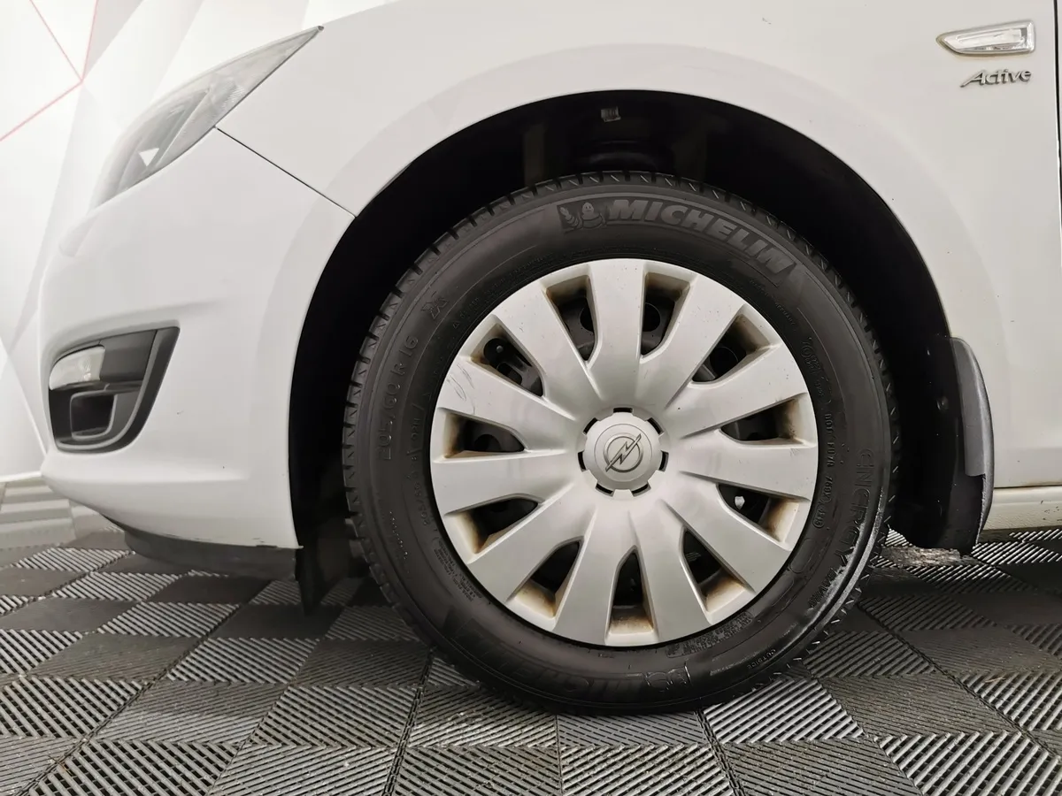 Opel Astra 1.6 AT (115 л.с.) Белый в АВИЛОН. Слайд №9