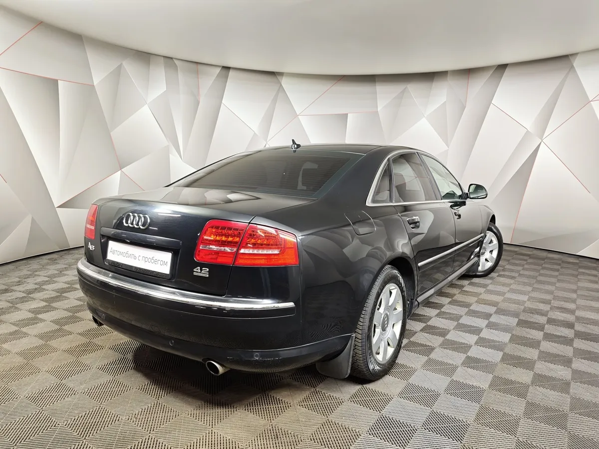Audi A8 4.2 FSI quattro tiptronic (372 л.с.) Черный в АВИЛОН. Слайд №2