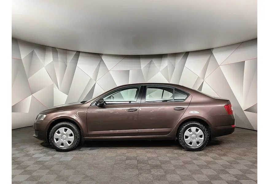 Skoda Octavia 1.6 MPI MT (110 л.с.) Коричневый в АВИЛОН. Слайд №5