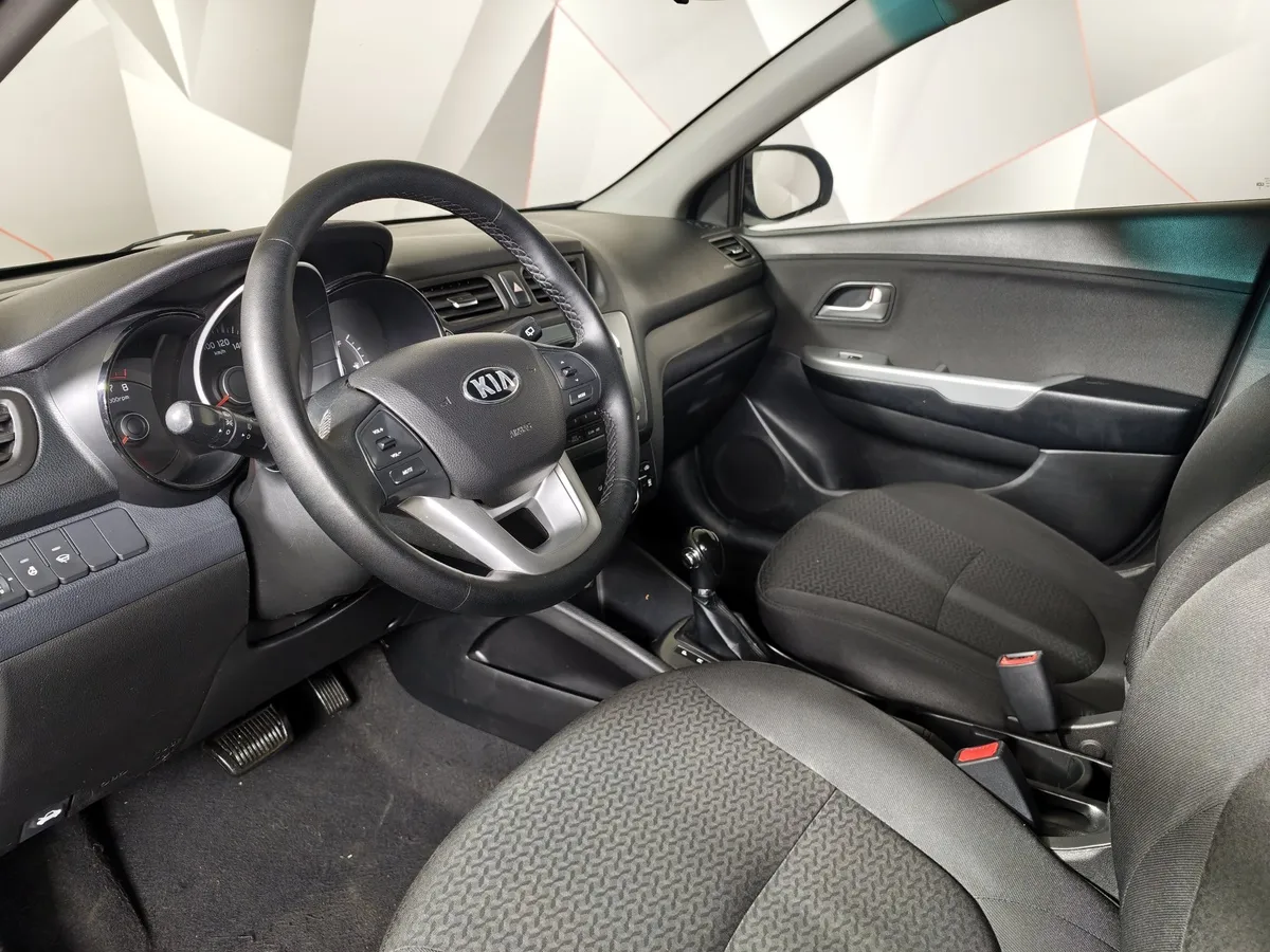 Kia Rio 1.6 AT (123 л.с.) Коричневый в АВИЛОН. Слайд №19
