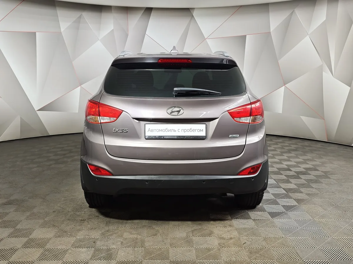 Hyundai ix35 2.0 AT 4WD (150 л.с.) Travel Коричневый в АВИЛОН. Слайд №8