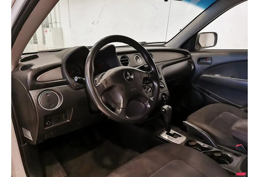 Mitsubishi Outlander 2.4 AT 4WD (160 л.с.) Белый в АВИЛОН. Слайд №18