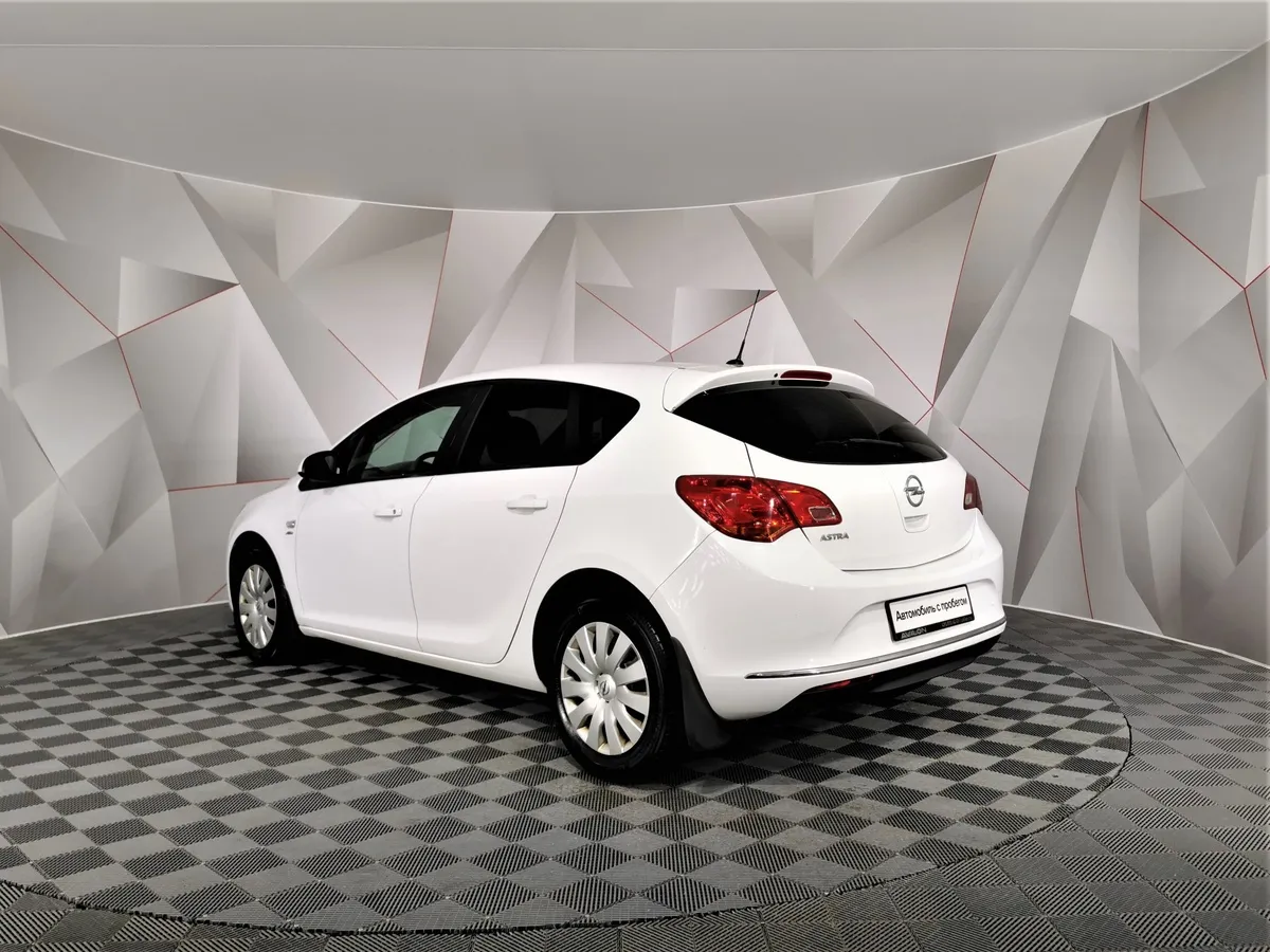 Opel Astra 1.6 AT (115 л.с.) Белый в АВИЛОН. Слайд №4