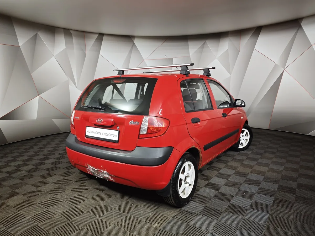 Hyundai Getz 1.4 MT (97 л.с.) Красный в АВИЛОН. Слайд №2