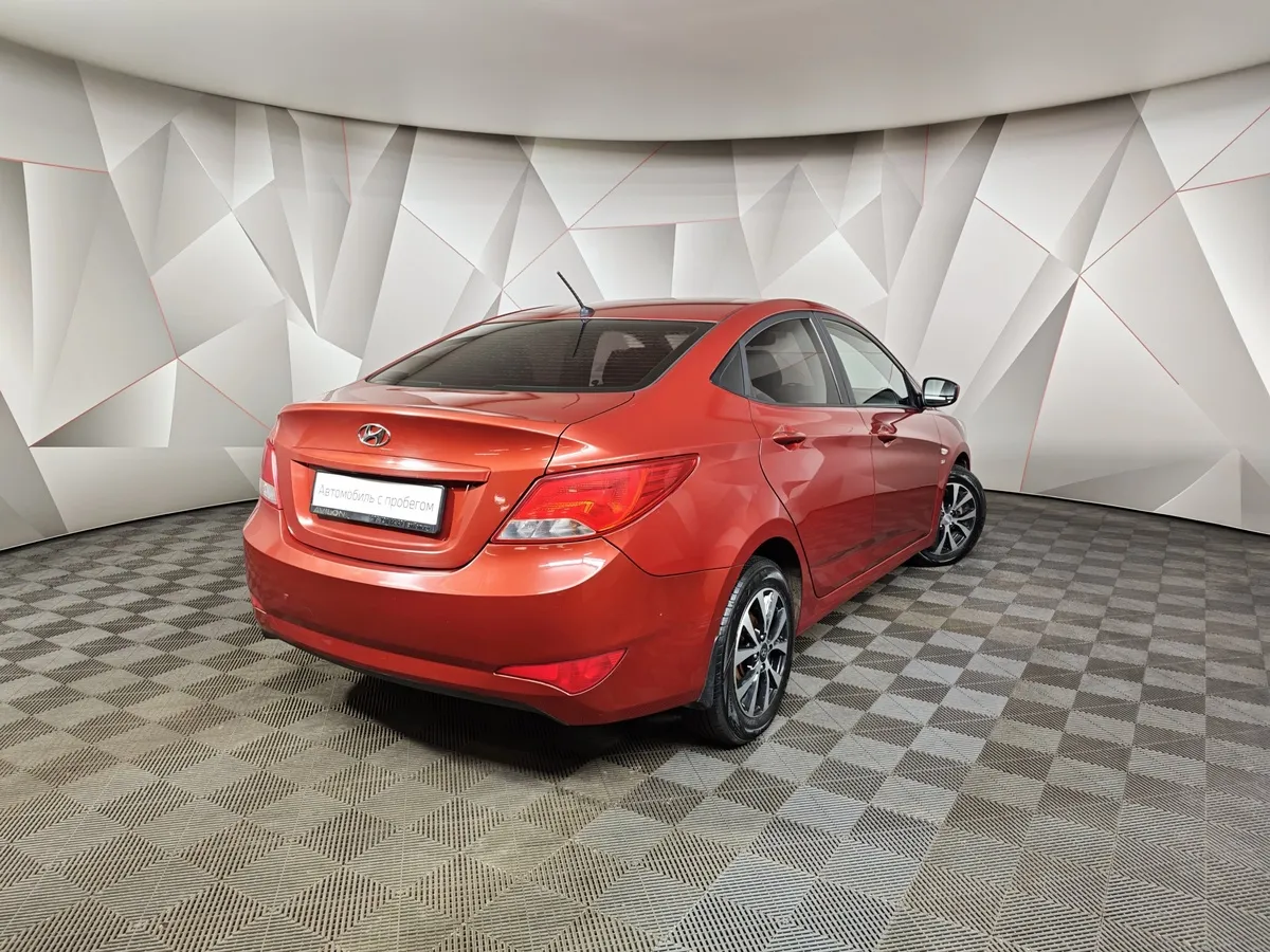 Hyundai Solaris 1.6 AT (123 л.с.) Comfort Красный в АВИЛОН. Слайд №2