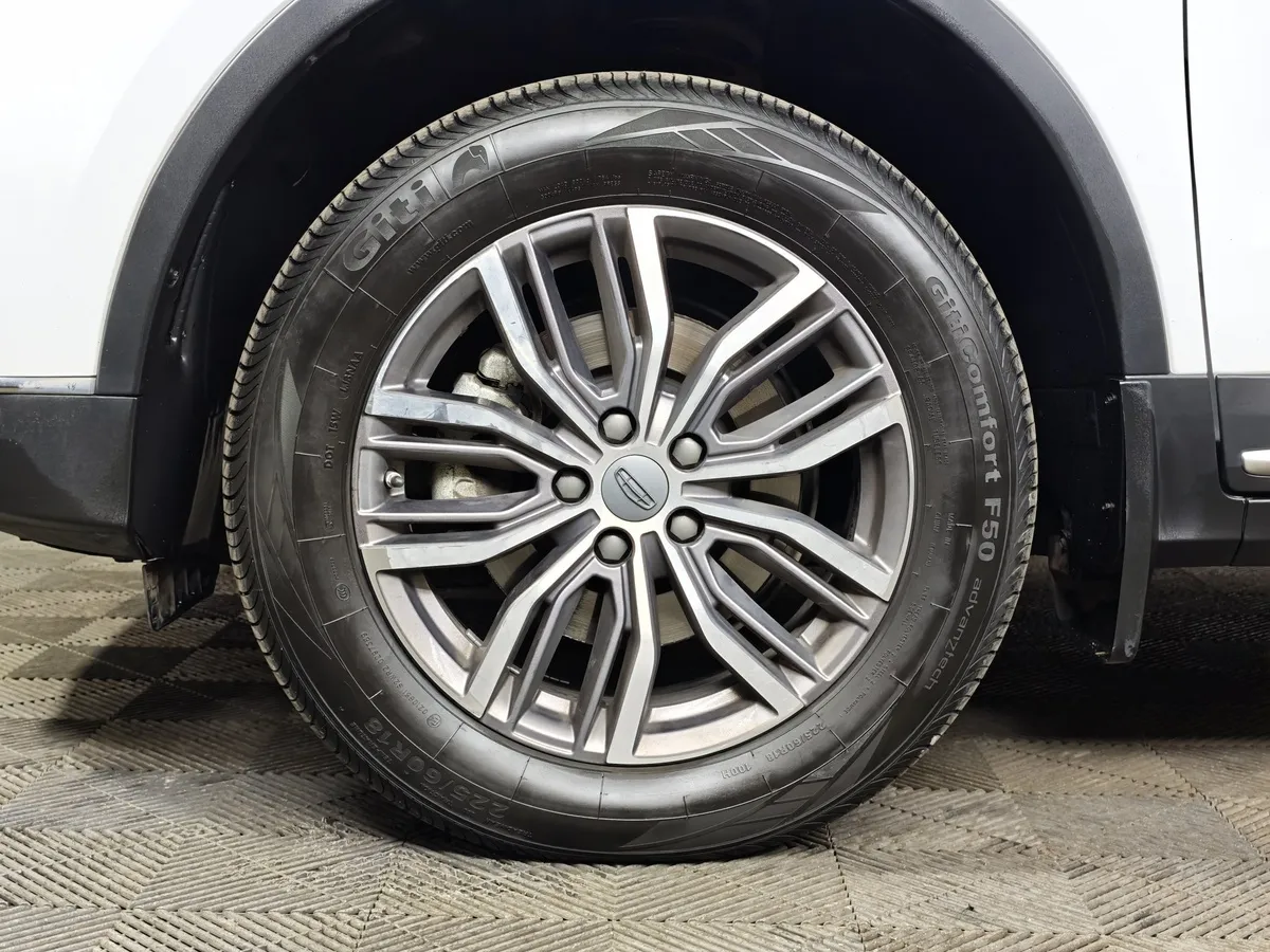 Geely Atlas Pro 1.5T 7DCT AWD (177 л.с.) Flagship Белый в АВИЛОН. Слайд №9
