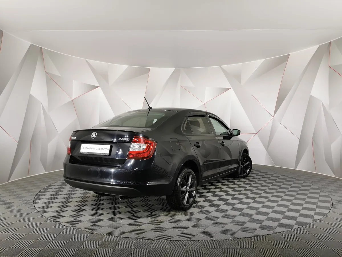 Skoda Rapid 1.4 TSI DSG (125 л.с.) Active Черный в АВИЛОН. Слайд №2