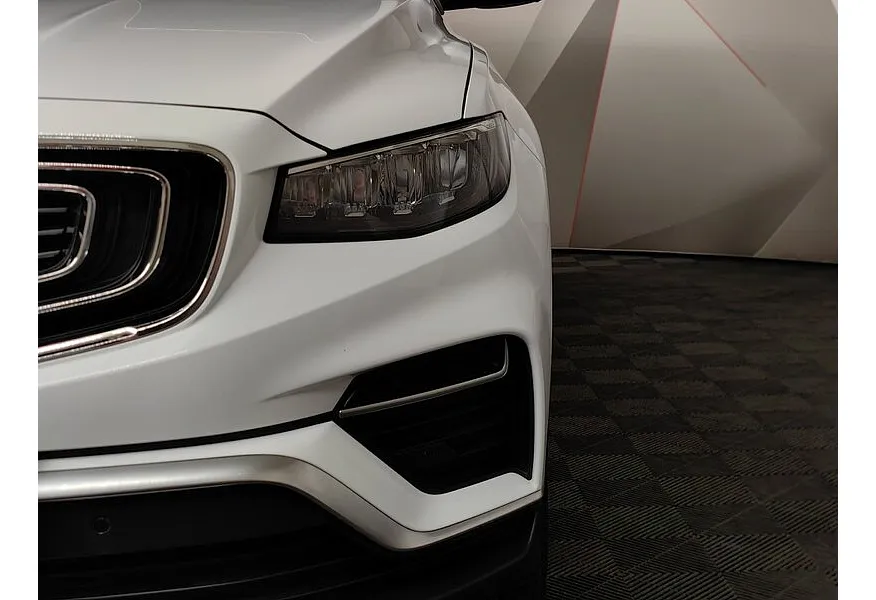 Geely Atlas Pro 1.5T 7DCT AWD (177 л.с.) Flagship Белый в АВИЛОН. Слайд №9