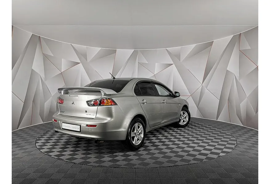 Mitsubishi Lancer 1.6 AT (117 л.с.) Серебристый в АВИЛОН. Слайд №2