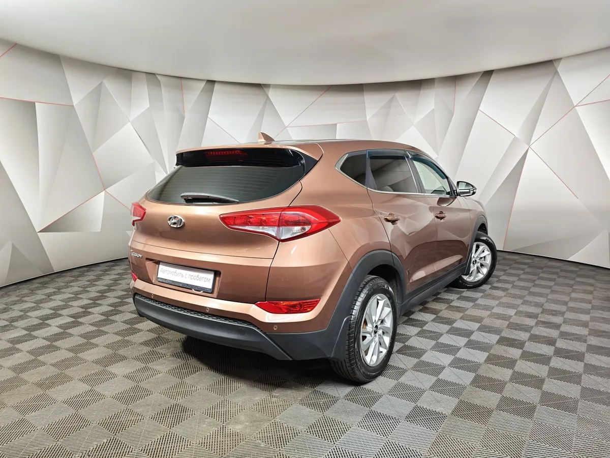 Hyundai Tucson 2.0 AT (150 л.с.) Comfort Коричневый в АВИЛОН. Слайд №2