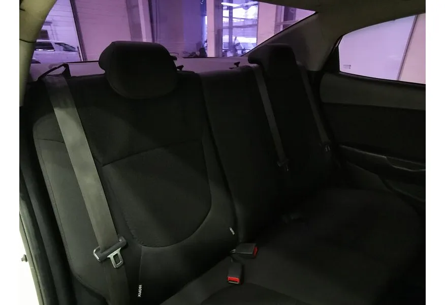 Kia Rio 1.6 AT (123 л.с.) Белый в АВИЛОН. Слайд №14