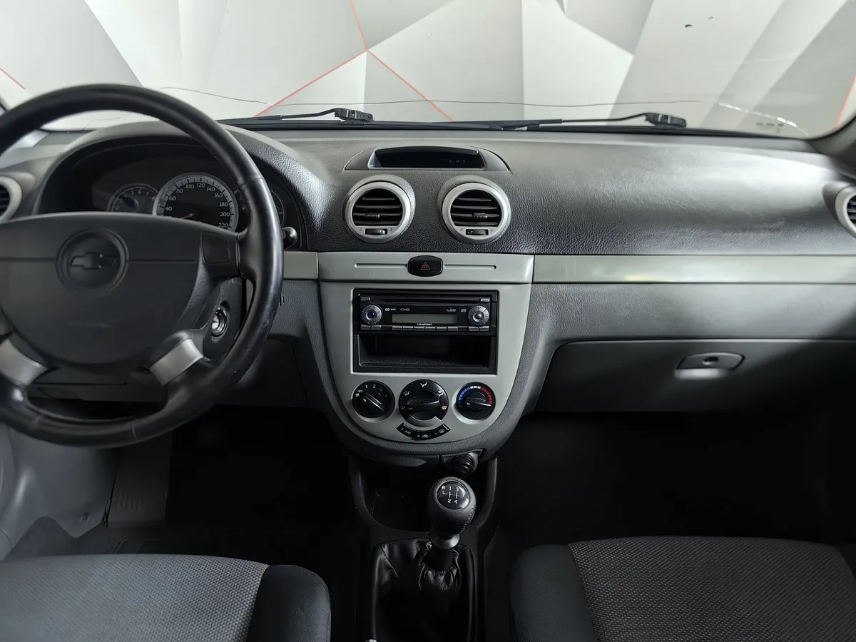 Chevrolet Lacetti 1.4 MT (95 л.с.) Серебристый в АВИЛОН. Слайд №12