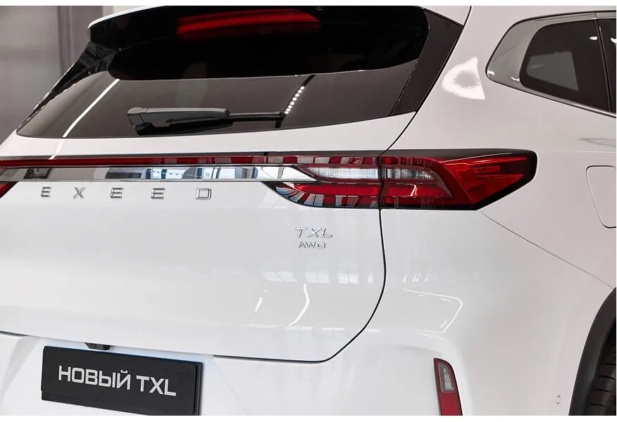 EXEED TXL 2.0 8AT AWD (197 л.с.) Flagship Белый в АВИЛОН. Слайд №12