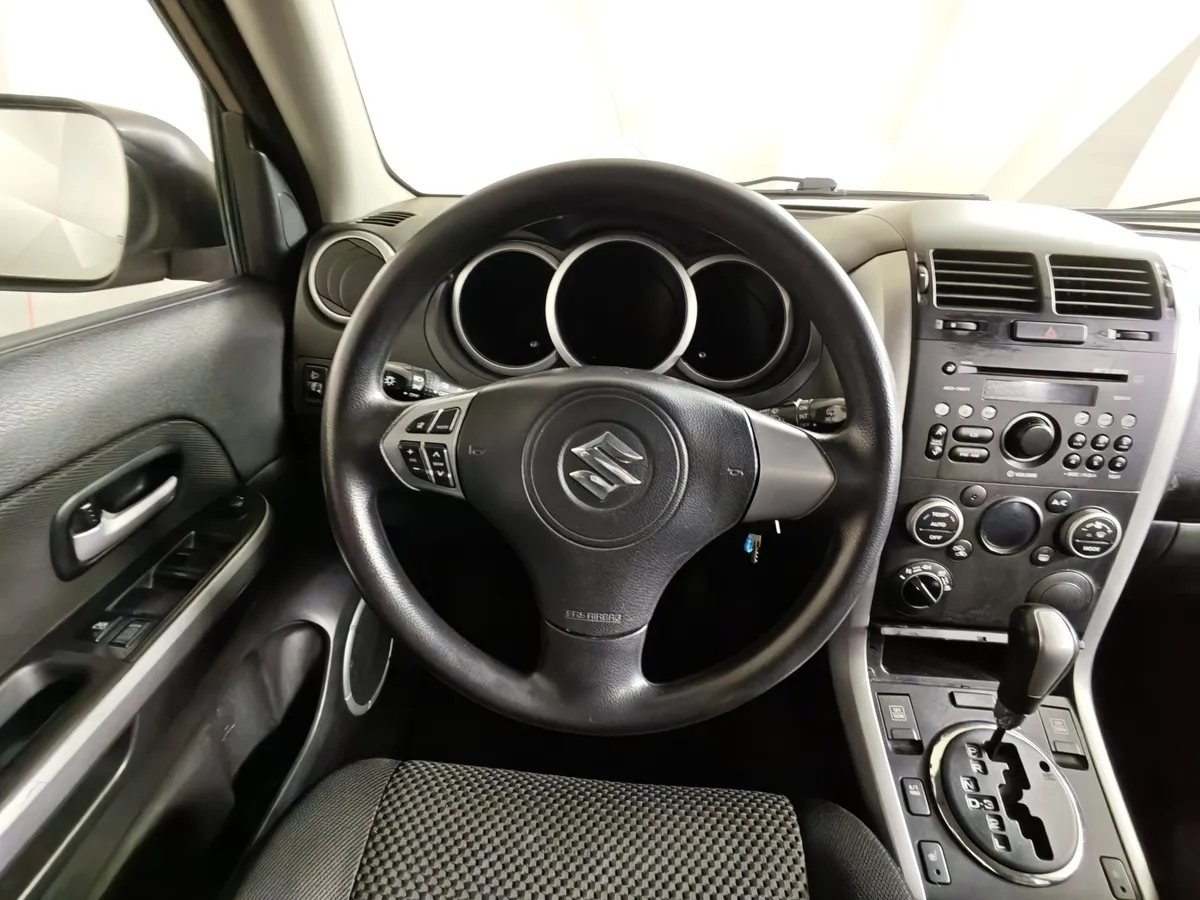 Suzuki Grand Vitara 2.0 AT AWD (140 л.с.) Бежевый в АВИЛОН. Слайд №19
