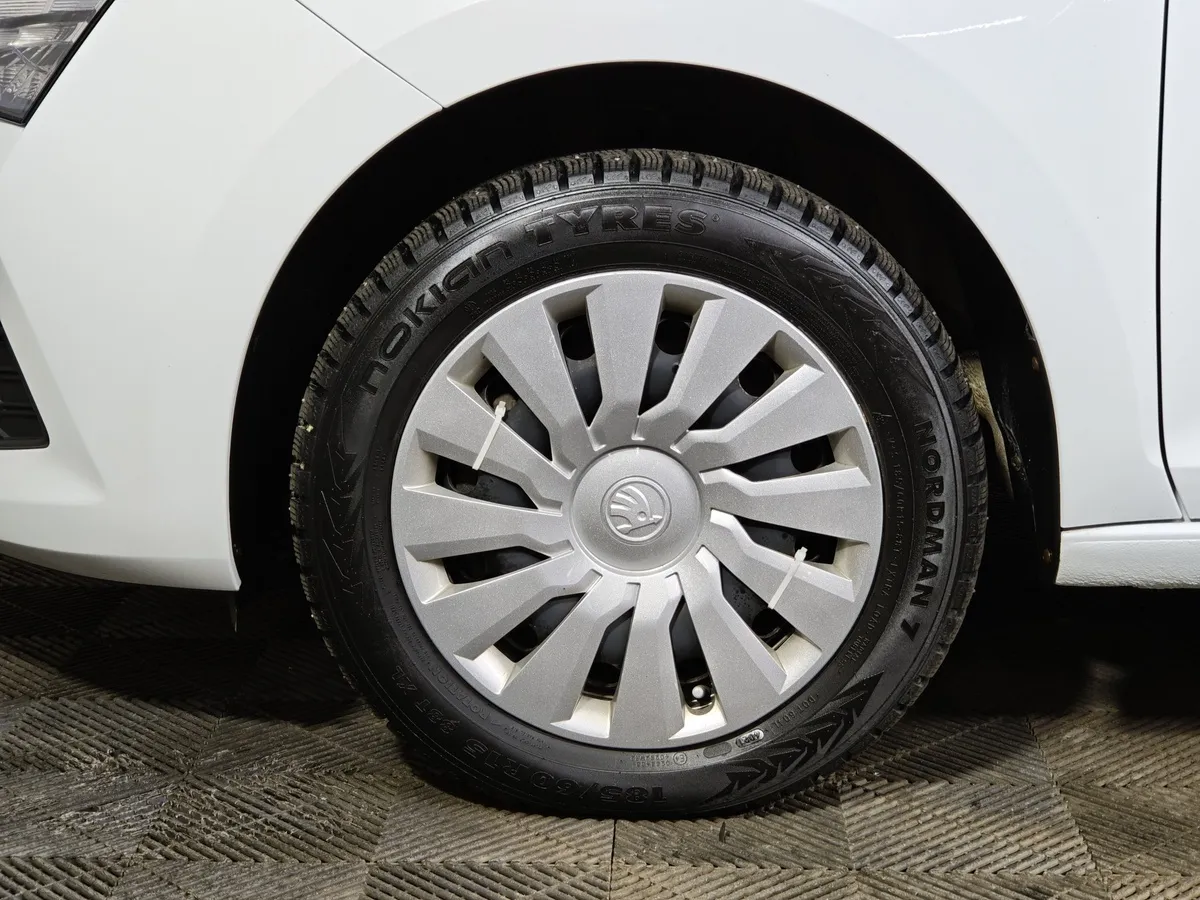 Skoda Rapid 1.6 AT (110 л.с.) Белый в АВИЛОН. Слайд №9