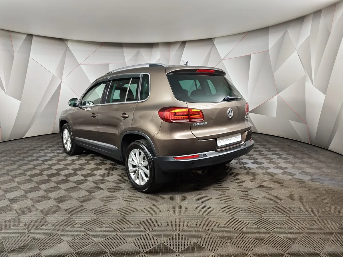 Volkswagen Tiguan 2.0 TSI 4Motion AT (180 л.с.) Sport & Style Коричневый в АВИЛОН. Слайд №4